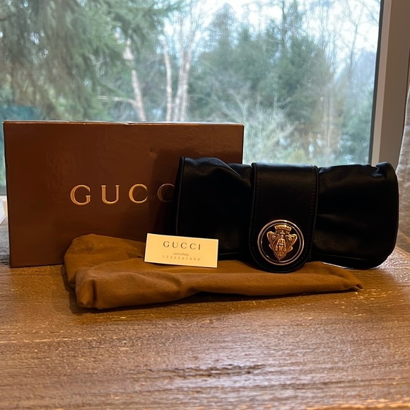 New Gucci black clutch with gold accents in box with dust bag - Picture 1 of 7